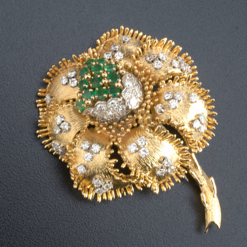 Appraisal: Stylized rose brooch with diamonds and emeralds in k yg