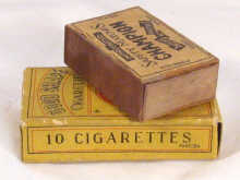 Appraisal: A trick box of cigarettes and matches the match box