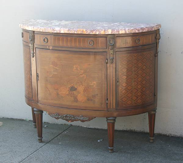 Appraisal: A Louis XVI style gilt metal mounted demi lune commode