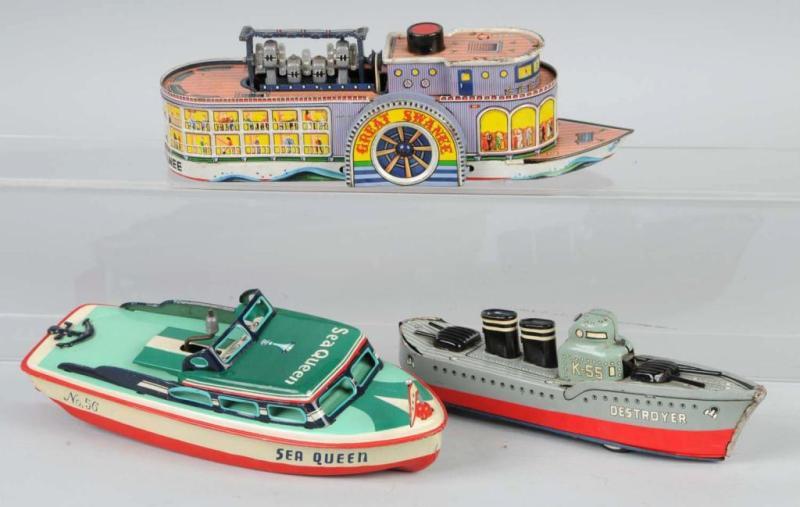 Appraisal: Lot of Tin Boat Toys Description Japanese Working Includes one