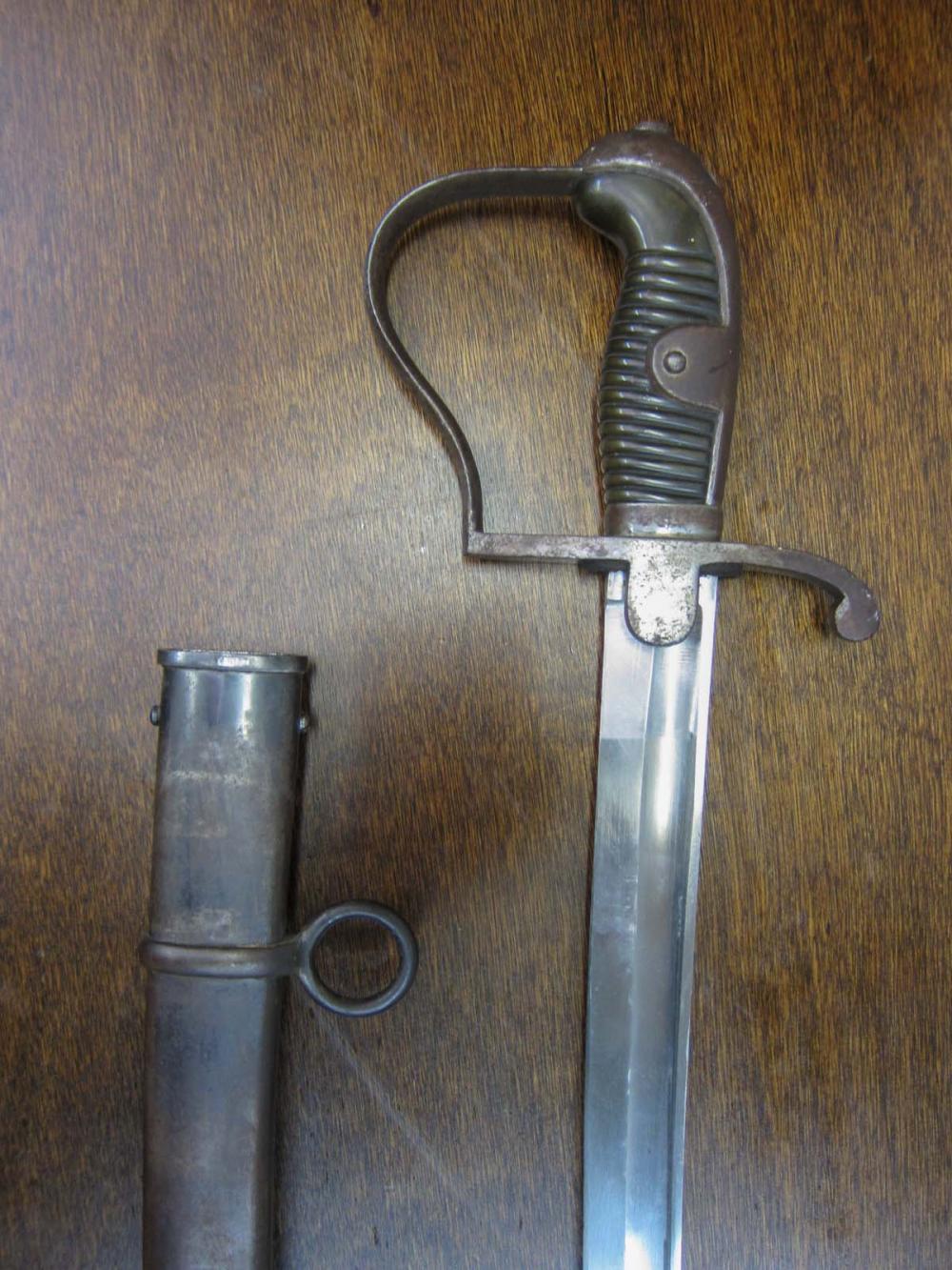 Appraisal: PRUSSIAN MODEL ARTILLERY SWORD having heavy slight curve blade with