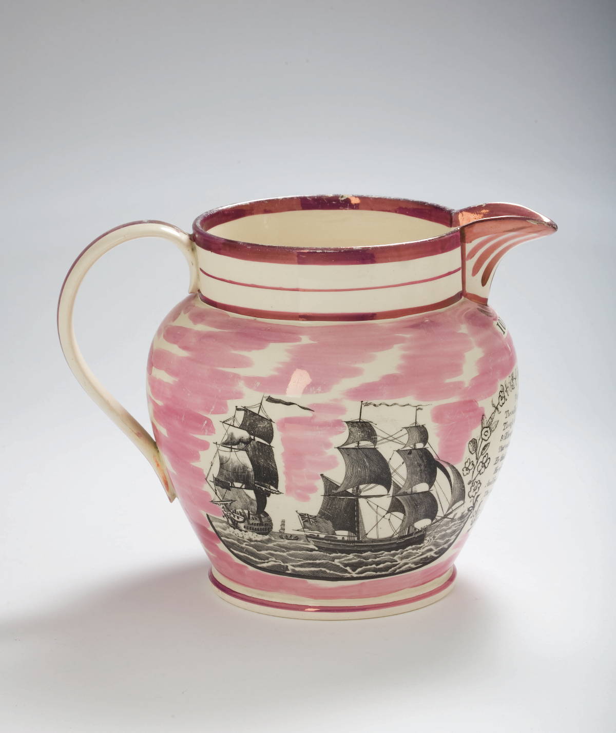 Appraisal: SUNDERLAND CREAMWARE PINK PURPLE LUSTRE AND BLACK TRANSFER-PRINTED PRESENTATION JUG