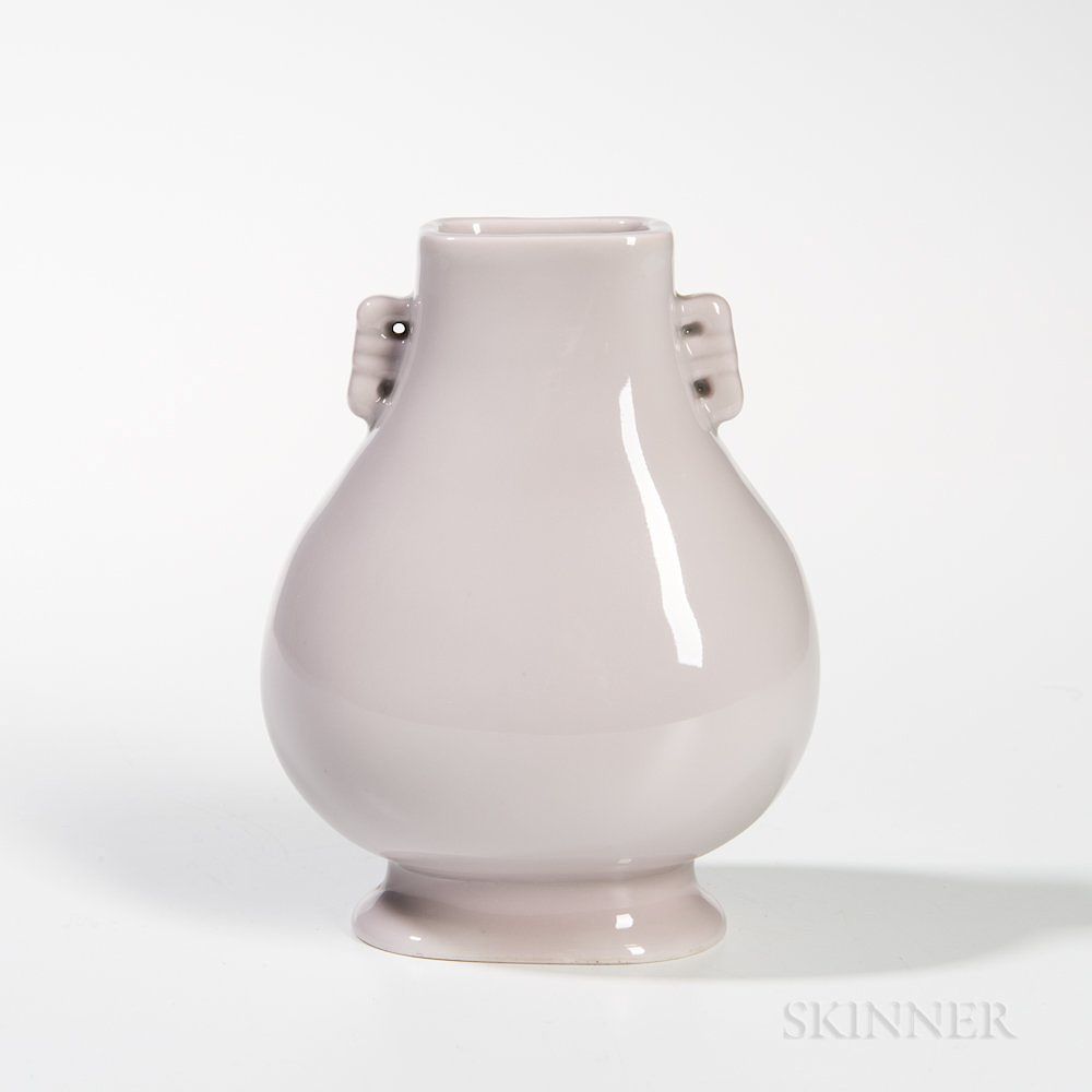 Appraisal: Off-white-glazed Vase Off-white-glazed Vase China hu form with pierced rectangular