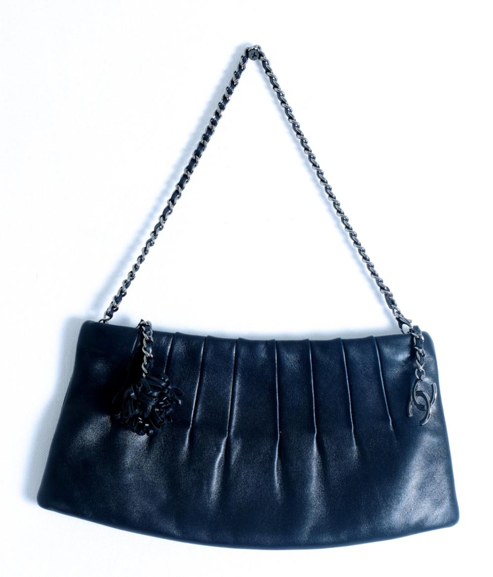 Appraisal: CHANEL BLACK LAMBSKIN CAMELLIA CLUTCHChanel black lambskin Camellia clutch made