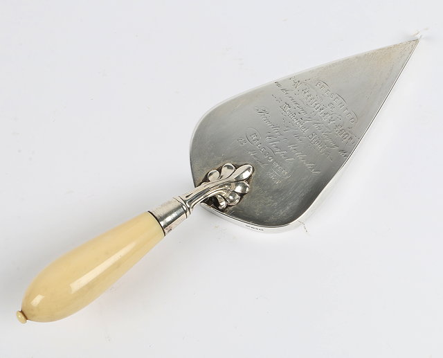 Appraisal: A VICTORIAN SILVER PRESENTATION TROWEL to celebrate the memorial stone