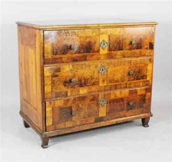 Appraisal: An th century North European inlaid walnut chest of four