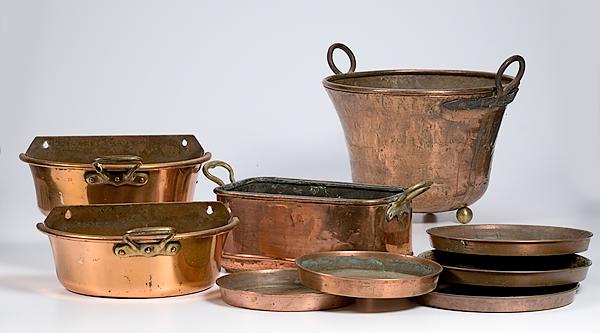 Appraisal: COPPER PLANTERS AND SAUCERS Copper planters with brass handles from