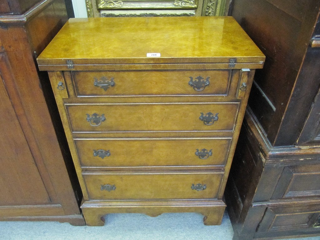 Appraisal: Reproduction walnut chest of drawers with turnover top