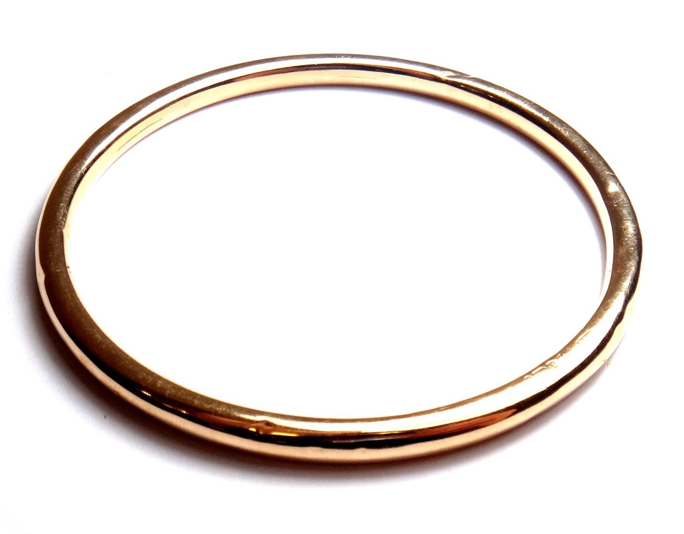 Appraisal: A ct gold circular hollow bangle Chester gross weight gms