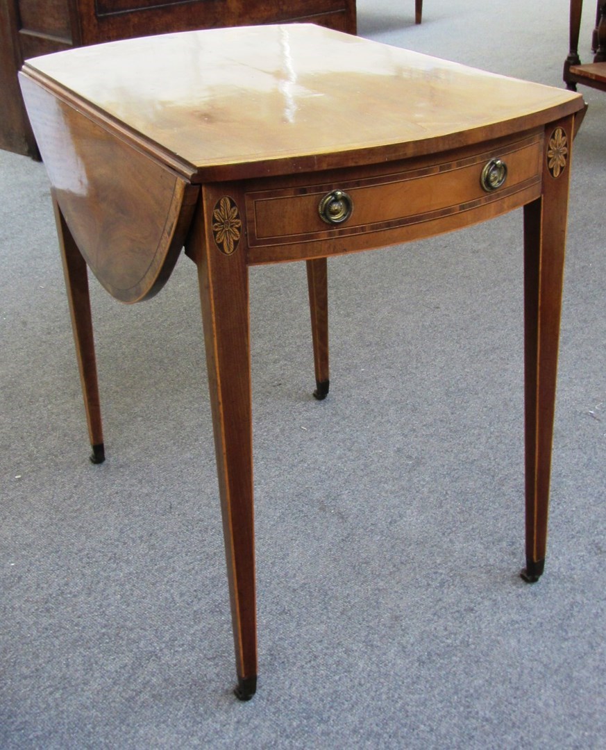 Appraisal: A George III mahogany and box strung Pembroke table the