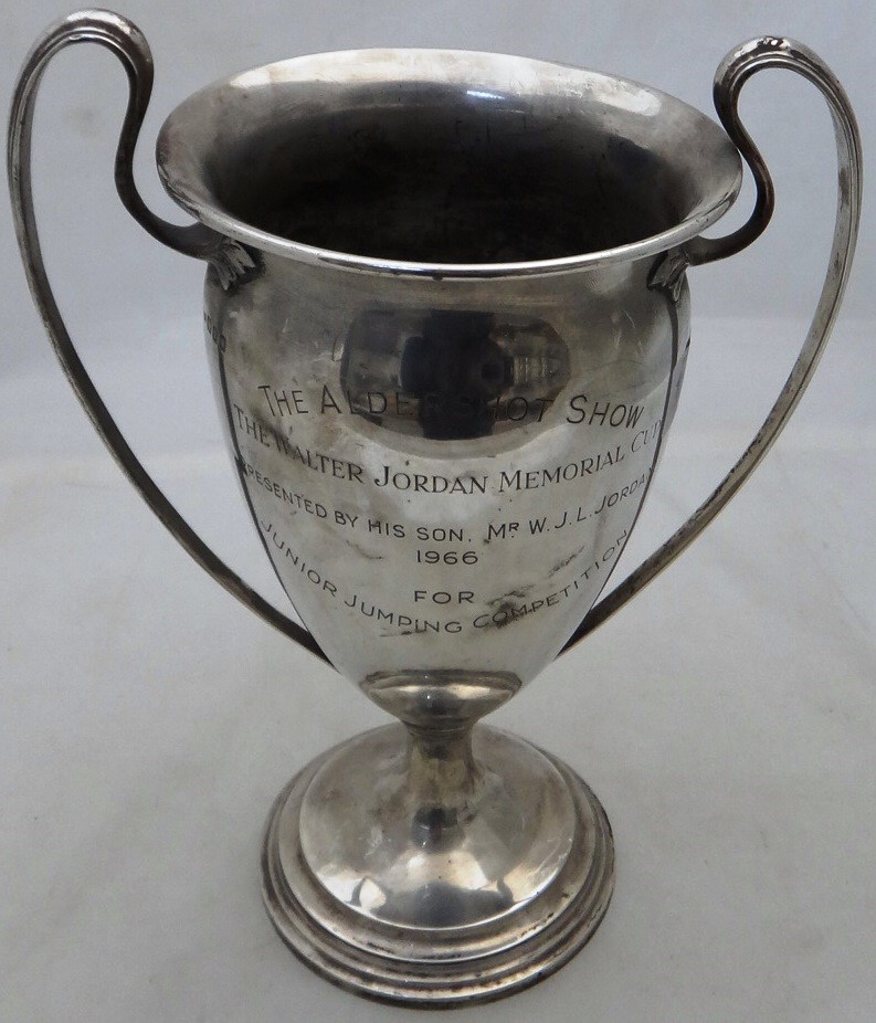 Appraisal: A silver twin handled trophy cup presentation inscribed on a