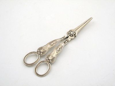 Appraisal: A pair of Victorian silver King's pattern grape scissors by