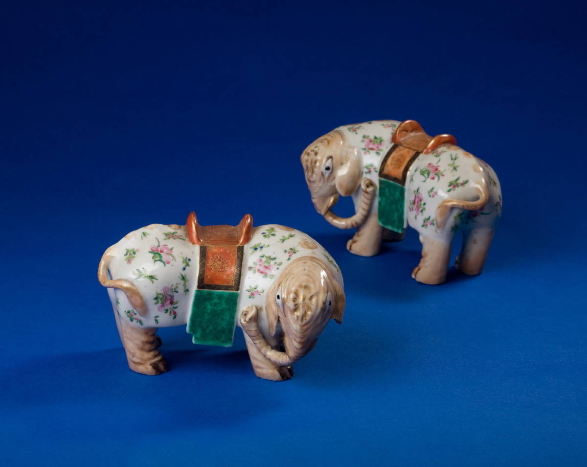 Appraisal: PAIR OF CHINESE EXPORT PORCELAIN FAMILLE ROSE FIGURES OF ELEPHANTS