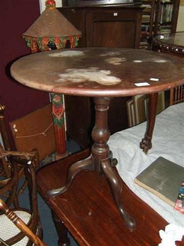 Appraisal: A Georgian mahogany circular tripod table with bird cage support