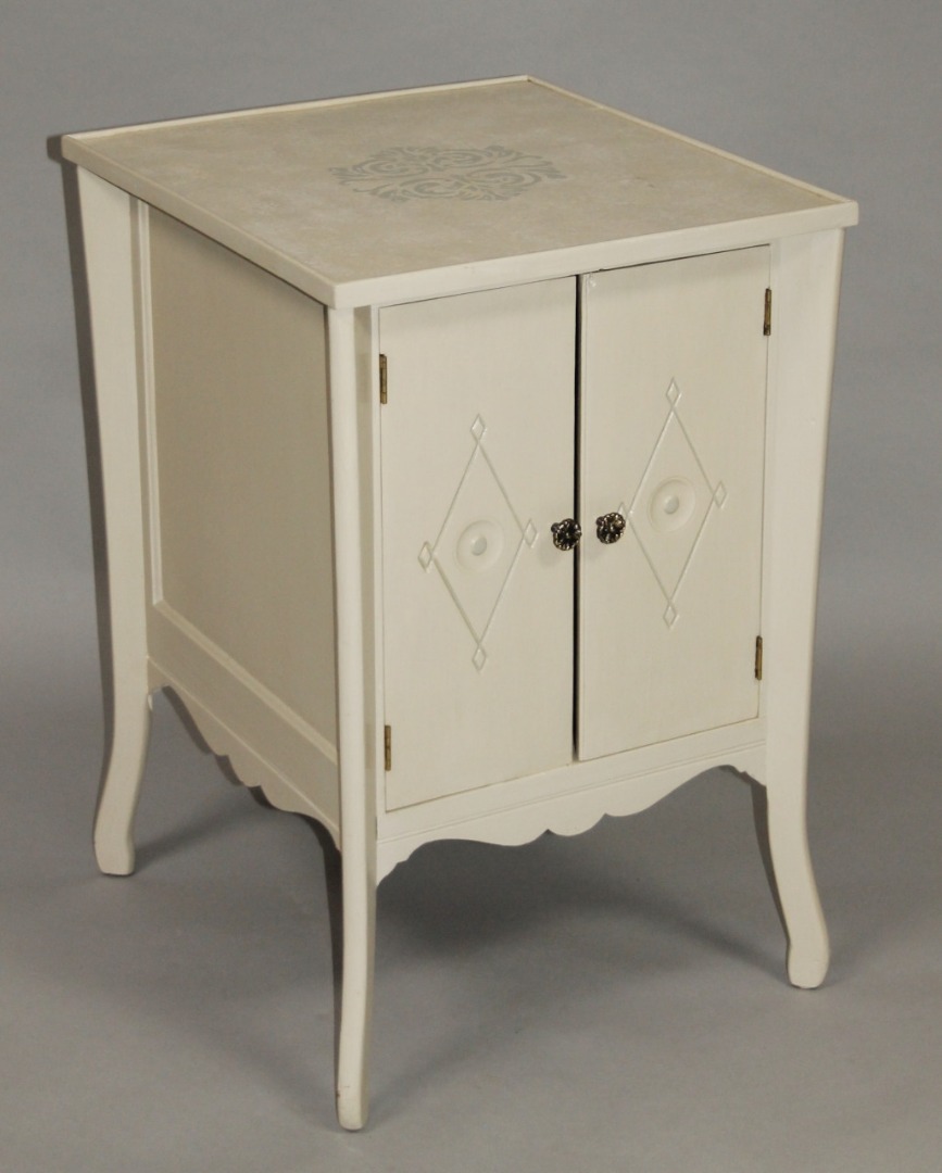 Appraisal: A thC painted music cabinet the square top stenciled with