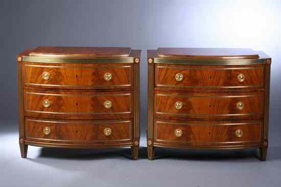 Appraisal: PAIR RUSSIAN NEOCLASSICAL MAHOGANY BRASS-INLAID AND GILT-METAL MOUNTED BOW-FRONT CHEST-OF-DRAWERS