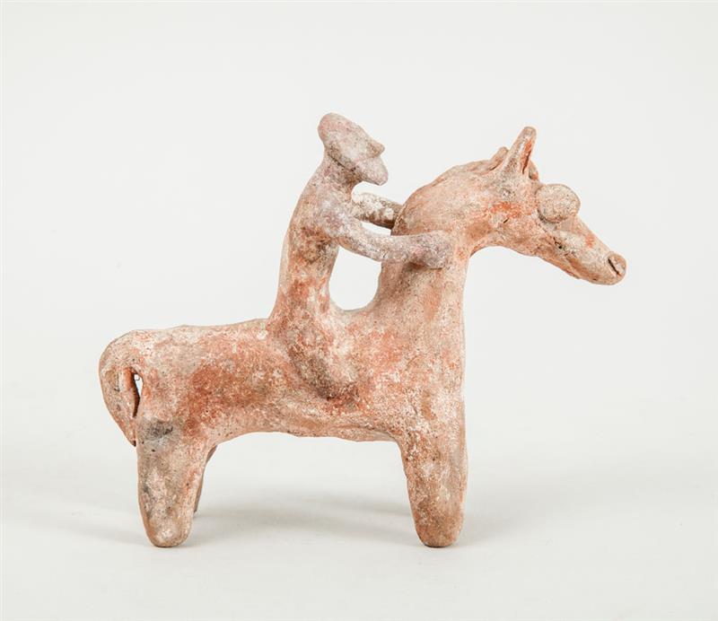 Appraisal: CYPRIOT PAINTED TERRACOTTA EQUESTRIAN GROUP The bearded bareback rider holding