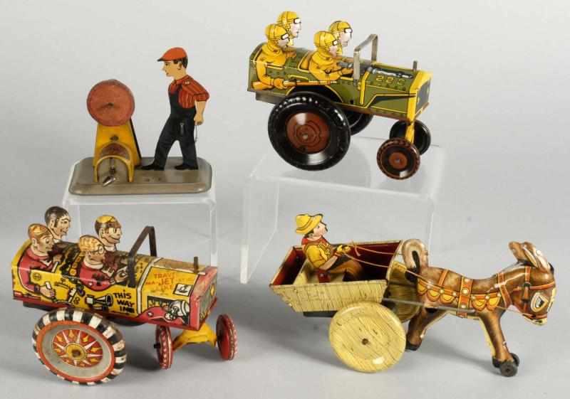 Appraisal: Lot of Tin Litho Toys Description American Includes two Marx