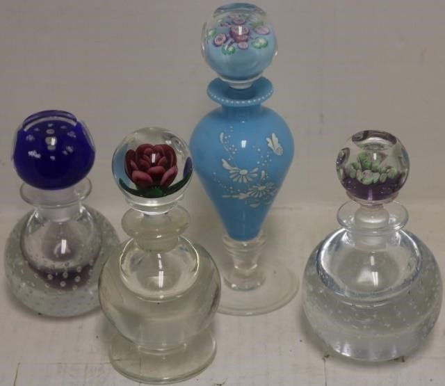 Appraisal: PAIRPOINT PAPERWEIGHT STOPPER BOTTLES TWOWITH CONTROLLED BUBBLES ONE WITH ENAMEL