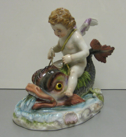 Appraisal: MEISSEN PORCELAIN FIGURE GROUP Cupid Riding a Dolphin Pommel Sword