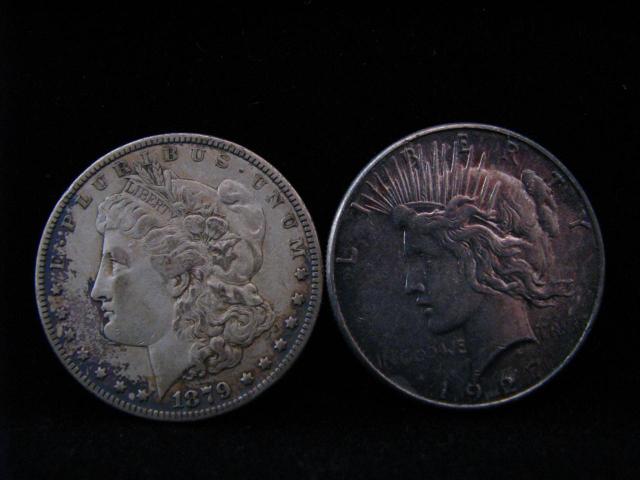 Appraisal: Two U S Silver Dollars including one Peace dollar and