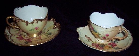 Appraisal: A Royal Worcester cup and saucer the asymmetrical pierced gilded