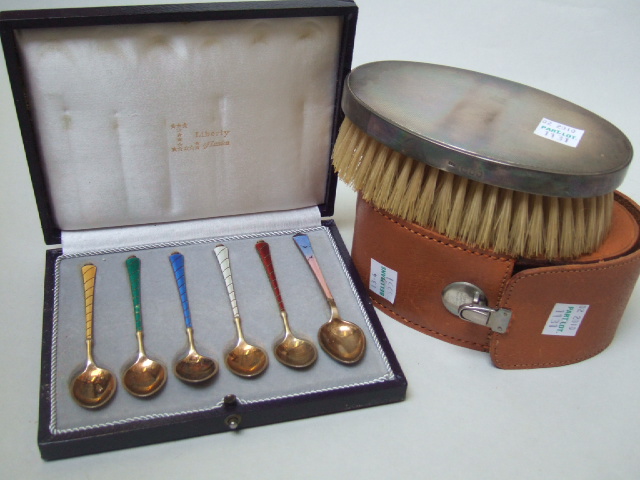 Appraisal: Five silver gilt coffee spoons with differing enameled decoration to