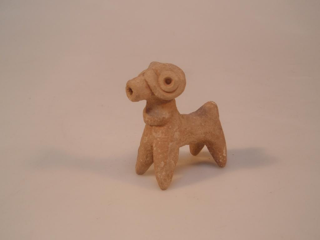 Appraisal: A restored terracotta zoomorphic figurine of a ram or goat