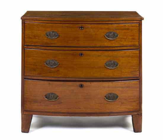 Appraisal: A Sheraton Mahogany Chest of Drawers having a bow front