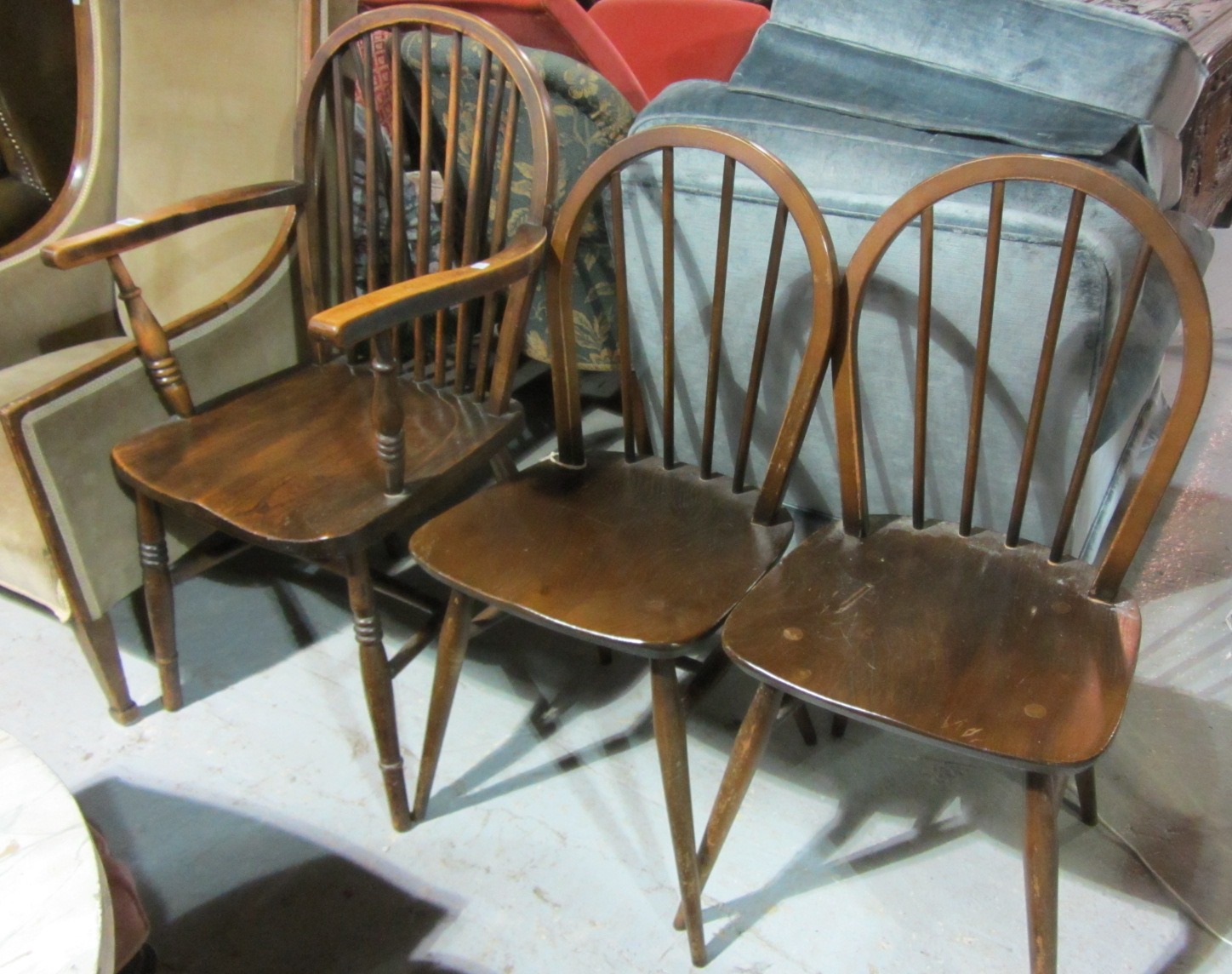 Appraisal: A th century oak armchair together with two Ercol dining