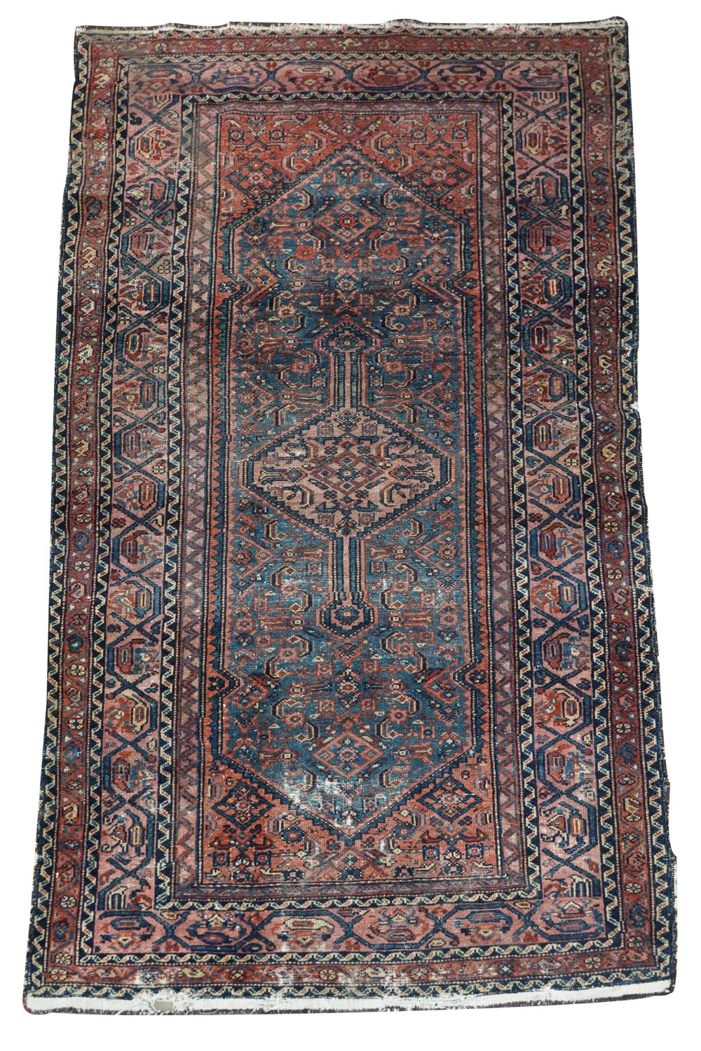 Appraisal: BLUE WOOL PERSIAN RUGCondition with wear throughout wear to selvedges