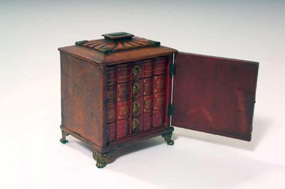 Appraisal: An early th century leather bound casket with brass mounts