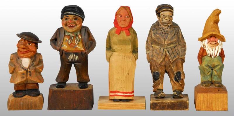 Appraisal: Lot of Carved Wooden Figures Condition Excellent Size Largest T