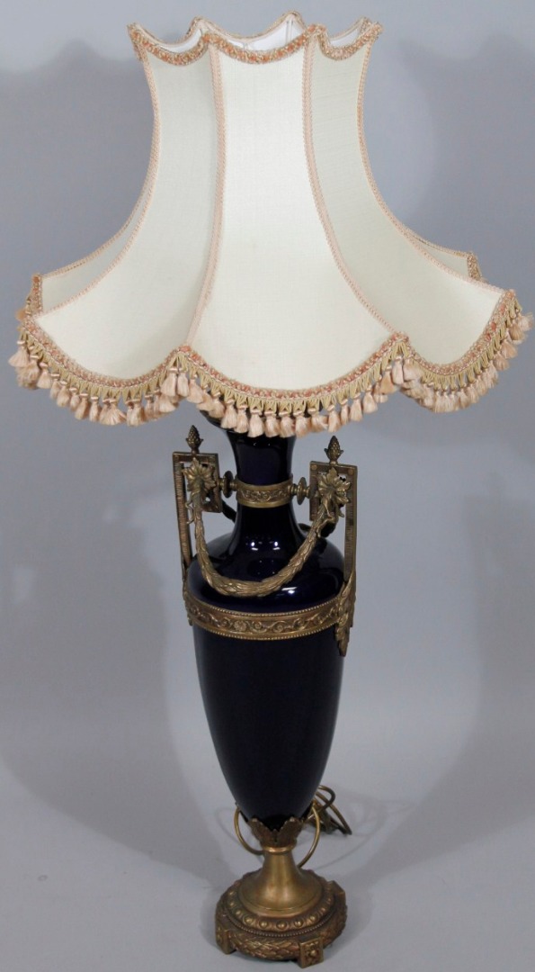 Appraisal: A modern Sevres style porcelain and ormolu finish table lamp