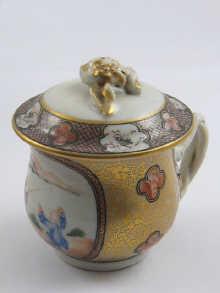 Appraisal: A Chinese porcelain hand painted and gilded cup and cover