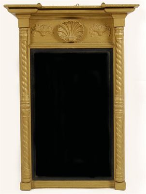 Appraisal: A th century giltwood pier mirror the inverted breakfront cornice