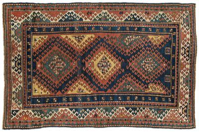 Appraisal: Caucasian rug three central medallions with conforming hook borders ft