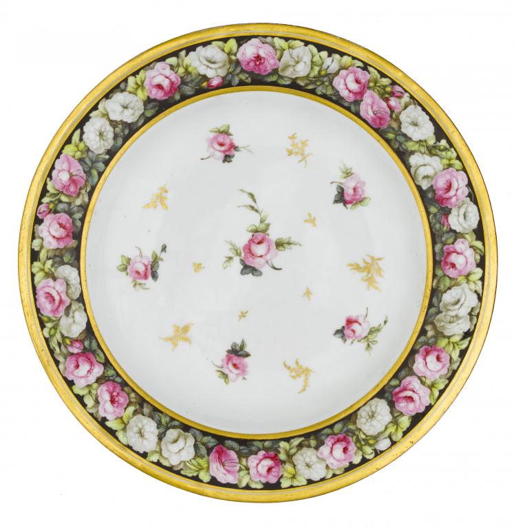 Appraisal: A DERBY SOUP PLATE painted with scattered roses interspersed with