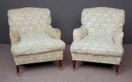 Appraisal: A pair of Howard Sons mahogany framed Bridgewater easy chairs