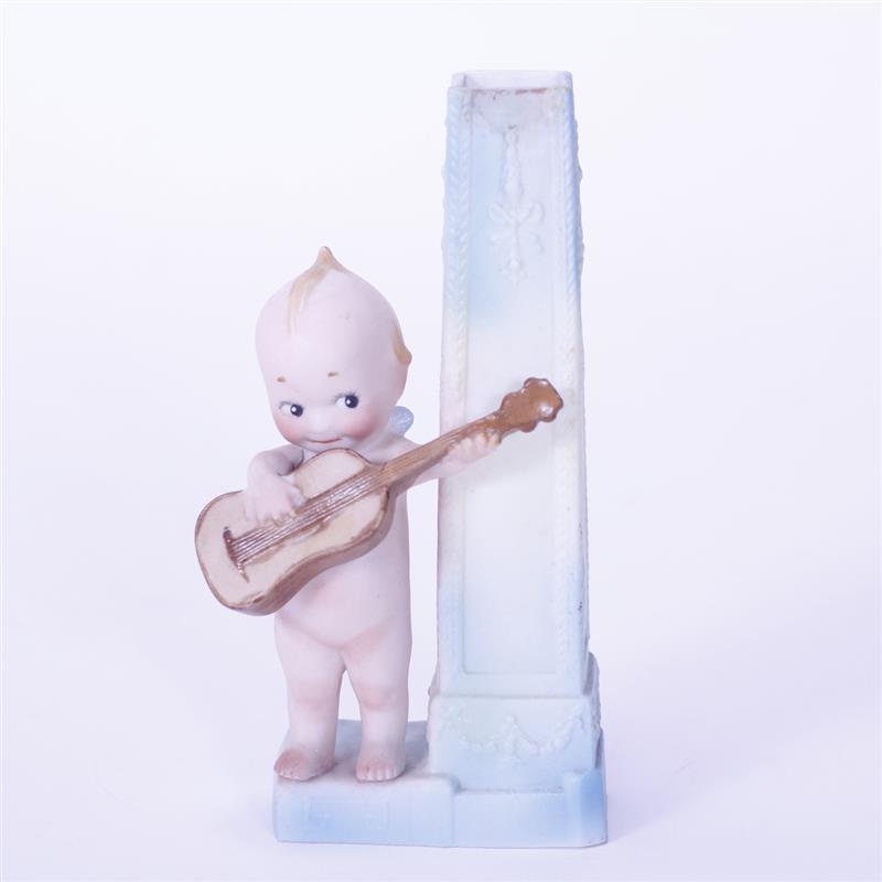 Appraisal: Rose O'Neill Action Kewpie bisque vase with figure playing guitar