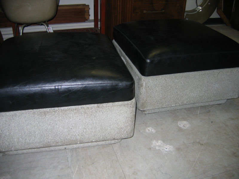 Appraisal: PAIR CAST CONCRETE BENCHES with black vinyl upholstery h w