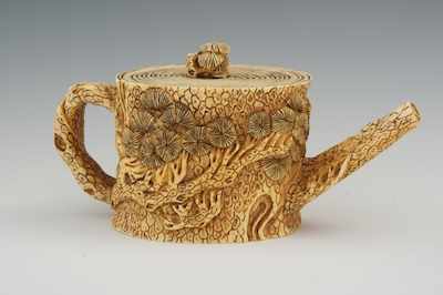 Appraisal: A Carved Ivory Tea Pot with Pine Tree Motif The