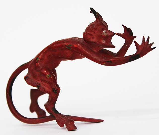 Appraisal: A COLD PAINTED BRONZE SCULPTURE OF A HORNED DEVIL cm