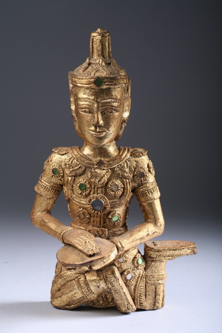 Appraisal: THAI GILT WOOD FIGURE OF MUSICIAN Kneeling wearing robe with