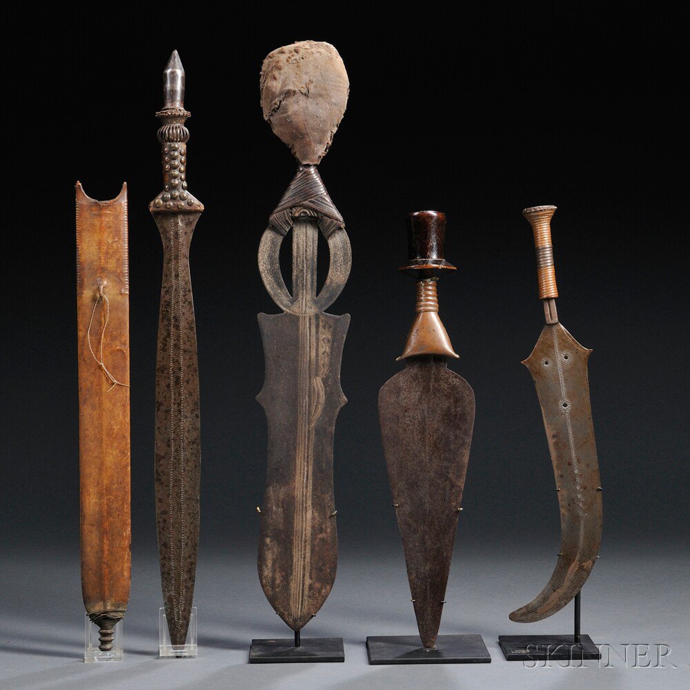 Appraisal: Four African Weapons includes a Yaka sword and sheath a