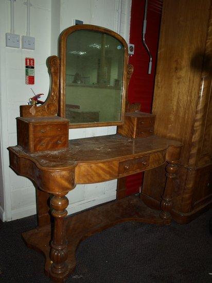 Appraisal: A Victorian satinwood dressing table the swing mirror over single