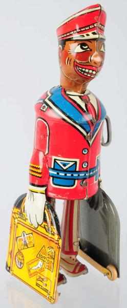 Appraisal: Tin Litho Marx Red Cap Porter Wind-Up Toy American Working