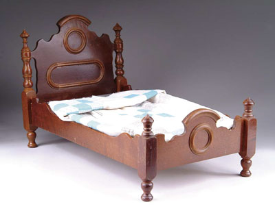 Appraisal: MAHOGANY th CENTURY DOLL S BED Poster bed with applied