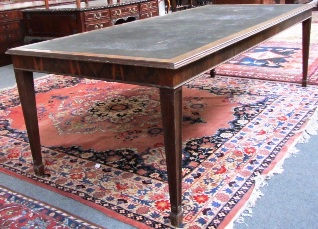 Appraisal: A large th century style rosewood library table the rectangular