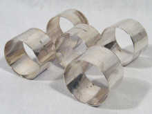 Appraisal: A set of five silver napkin rings hallmarked London maker